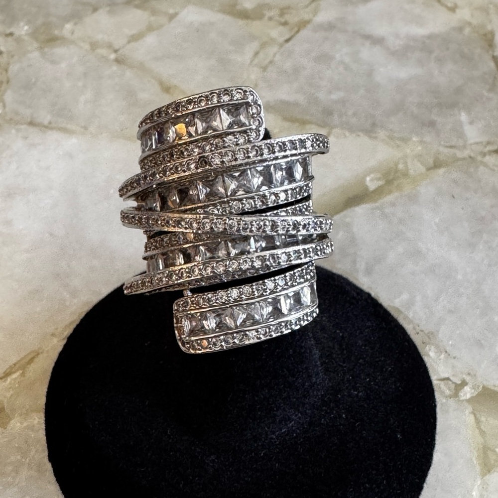Sterling Silver6.4 CT cubic Zirconia Cocktail Ring.
Measures 1.25” long. Sparkle